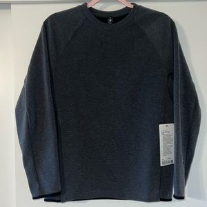 lulu lemon pull over dark grey, with zip up pockets